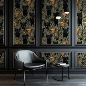 May include: Black and gold wallpaper with a repeating pattern of black cats wearing bow ties and holding martini glasses. The wallpaper is in a room with a black leather armchair and a black side table.