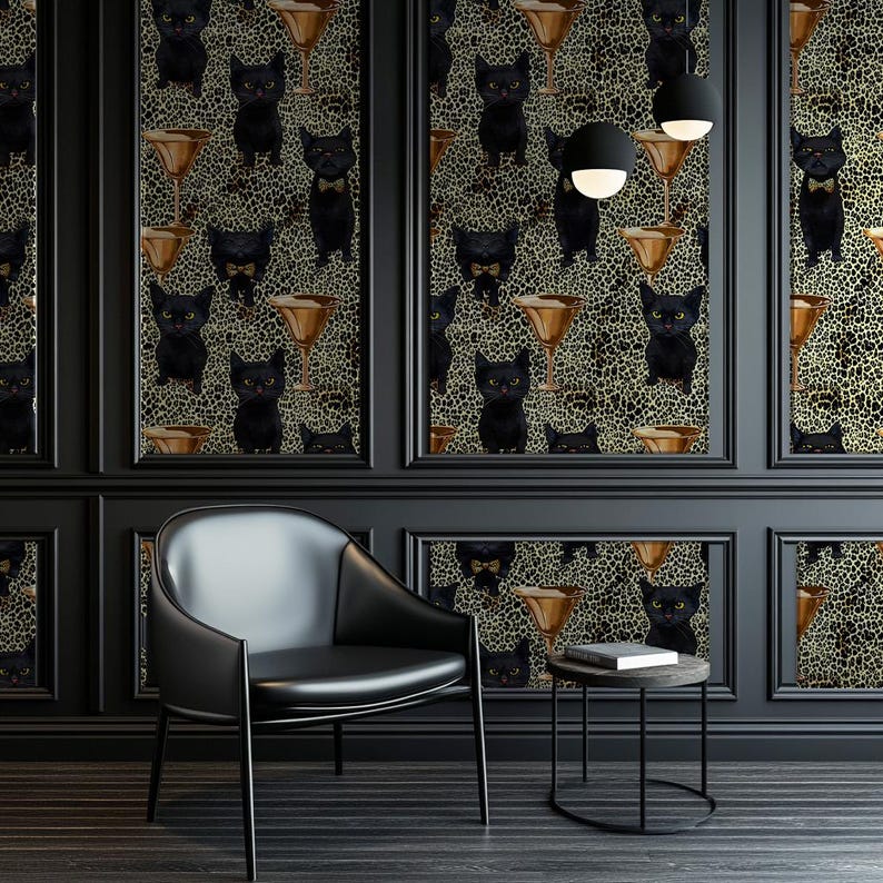 May include: Black and gold wallpaper with a repeating pattern of black cats wearing bow ties and holding martini glasses. The wallpaper is in a room with a black leather armchair and a black side table.