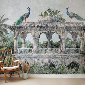 May include: A detailed mural depicting a classical gazebo with two peacocks perched on the roof. The gazebo is surrounded by lush greenery and palm trees, creating a serene, tropical scene. The color palette includes muted greens, blues, and browns.