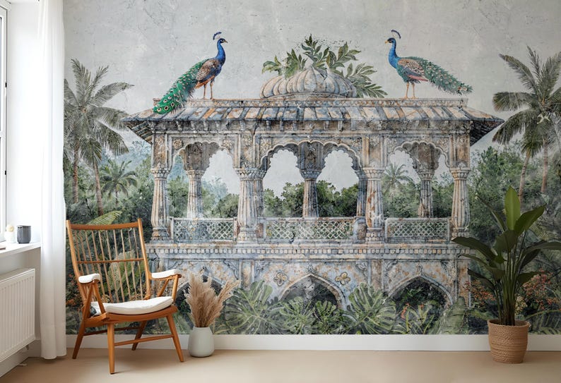 May include: A detailed mural depicting a classical gazebo with two peacocks perched on the roof. The gazebo is surrounded by lush greenery and palm trees, creating a serene, tropical scene. The color palette includes muted greens, blues, and browns.
