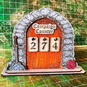 May include: A wooden campaign counter with a stone arch design and an orange door. The counter displays the number 274. A sword and a red die are on either side of the door. The text "Campaign Counter" is above the numbers.