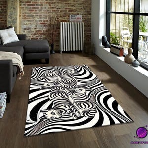 May include: A monochrome area rug with a striking optical illusion design. The rug features a repeating pattern of black and white stripes, creating a sense of depth and movement. The design includes stylized cat figures. Suitable for a living room or similar space.