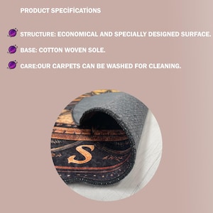 May include: A rolled-up carpet with a black and brown pattern, showing the letter "S". The text "COTTON THIN BASE" and product specifications are displayed. The base is cotton woven, and the carpet is washable.