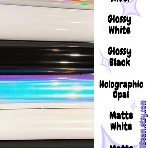 May include: A stack of six vinyl rolls featuring various finishes: holographic silver, glossy white, glossy black, holographic opal, matte white, and matte black. Text labels next to each roll identify the colour and finish, with KawaiiBeam.etsy.com at the bottom.