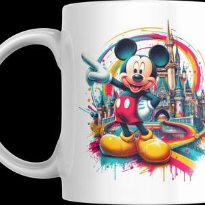 May include: White ceramic mug featuring a colorful illustration of Mickey Mouse pointing towards a castle. Mickey is wearing red shorts, yellow shoes, and white gloves. The background includes a rainbow-colored design.