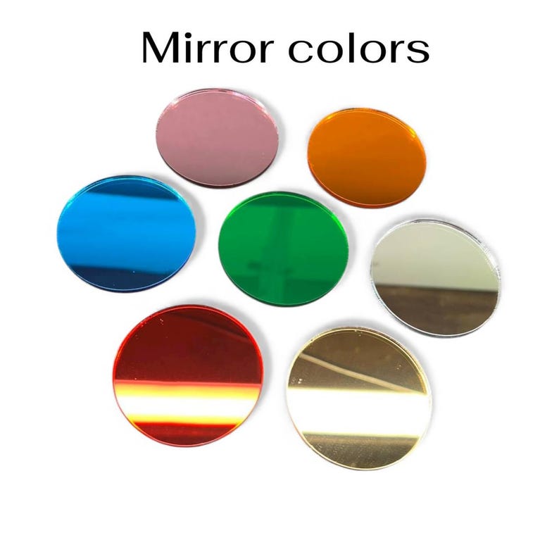 May include: A collection of seven circular mirror pieces in various colors, including blue, green, red, gold, orange, silver, and pink. The text "Mirror colors" is displayed above the mirrors.