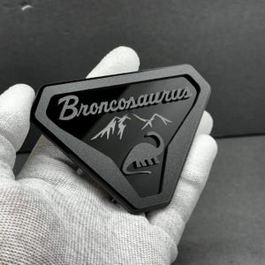 2x Car Fender Emblem Broncosaurus Car Badge Logo Ford Bronco Matte Black on Black Truck Offroad 4x4 SUV Truck Car-Safe Adhesive Easy Install