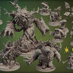 May include: A selection of grey miniature figurines with a swamp theme. The figures include a large tree-like creature, various frog-like characters, and other fantasy figures. The text "Swamps January Release" is visible.