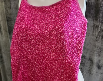 Felroze tanktop met cachekralen