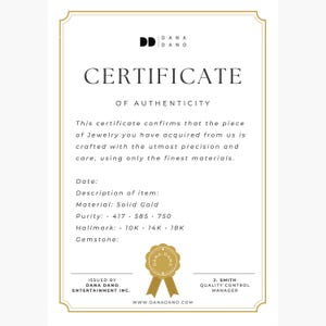May include: A certificate of authenticity with a gold seal and the text "CERTIFICATE OF AUTHENTICITY." The certificate includes details about the item, material, purity, hallmark, and gemstone. The certificate is issued by Dana Dano Entertainment Inc.