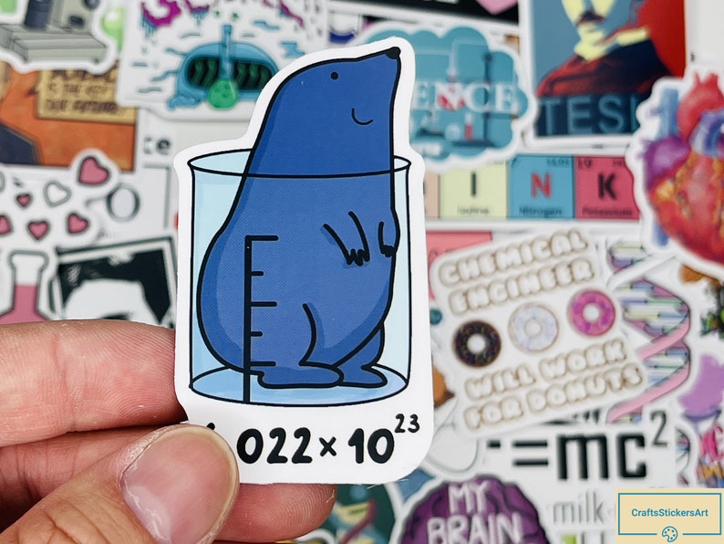 May include: A blue cartoon mole is inside a beaker with a graduated scale. The beaker is on a white background with the text "022 x 10^23" below it.