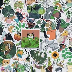 May include: A collection of colorful stickers featuring cats, plants, and other cute designs. The stickers are perfect for decorating journals, laptops, water bottles, and more.
