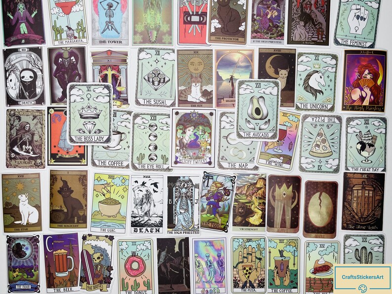 May include: A set of 36 tarot card stickers featuring various illustrations, including a cat, a unicorn, a pizza, a donut, a cactus, and a skull. The stickers are printed on white paper with a light green background.