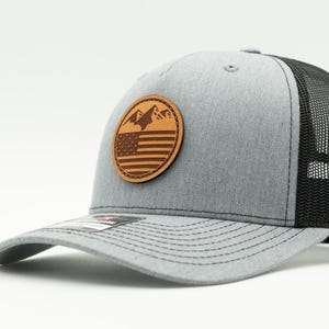 Trucker hat, Richardson 112FP five panel, mesh back, snapback, sewn leather patch, Mountain Flag