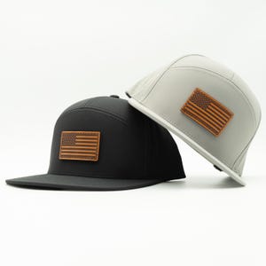 Gorra resistente al agua de alto rendimiento para trabajos al aire libre, 7 paneles, parche de cuero, cierre ajustable, bandera estadounidense.