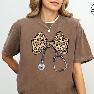 Comfort Colors® Leopard Stethoscope Shirt, Coquette Bow Nurse Shirt, Leopard Bow Shirt, Nurse Stethoscope Shirt, Gift For Nurse