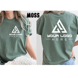 May include: A green t-shirt with a white triangle logo and the text "YOUR LOGO HERE" printed on the front.