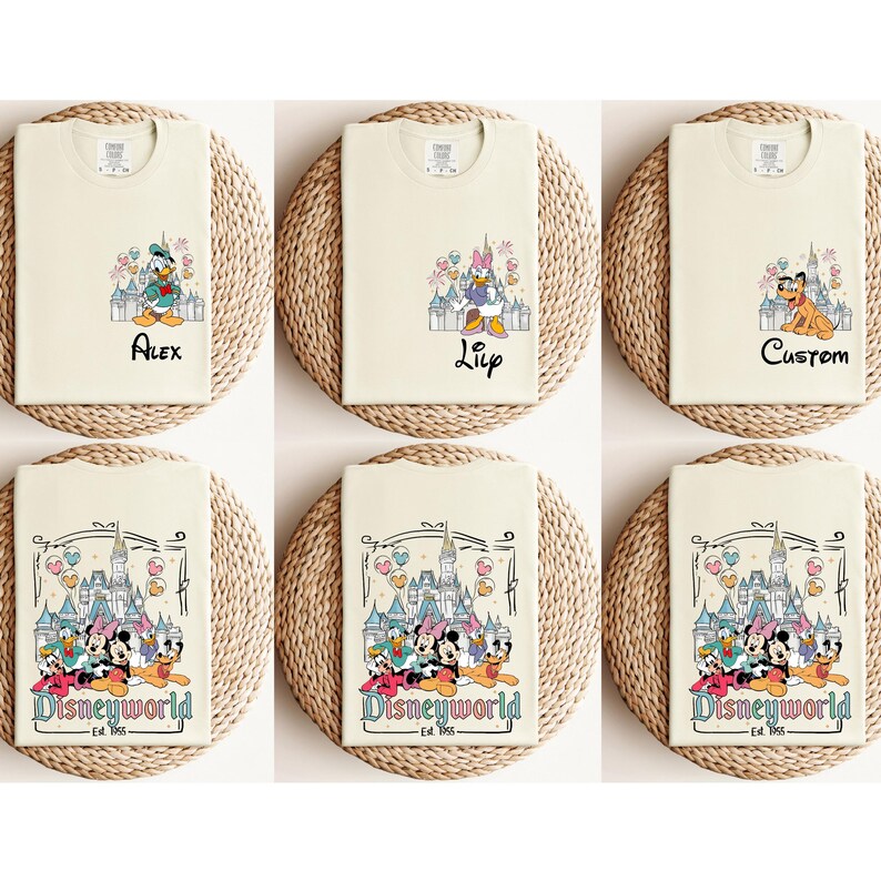 May include: Six cream-colored t-shirts with different Disney-themed designs. The designs include Mickey Mouse, Minnie Mouse, Donald Duck, Goofy, and Pluto. The shirts have the text "Disneyworld Est. 1965" and some have names like "Alex", "Lily", and "Custom".