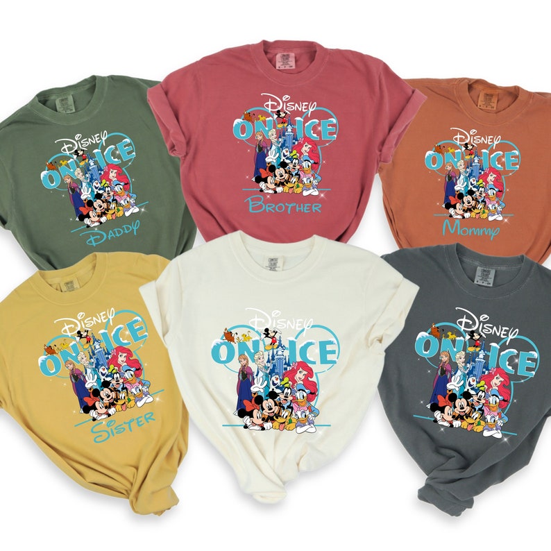 May include: Five t-shirts with a Disney on Ice theme. The shirts are in different colors and feature a graphic of Mickey Mouse, Minnie Mouse, Donald Duck, Goofy, and other Disney characters. The text "Disney on Ice" is printed on each shirt. The shirts are labeled with the words "Daddy", "Brother", "Mommy", "Sister", and "Disney on Ice".
