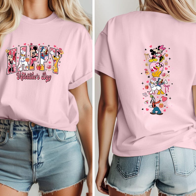 May include: A light pink t-shirt featuring the word "HAPPY" with Disney characters and the text "Valentine's Day". The back of the shirt has a vertical design with more Disney characters and hearts.