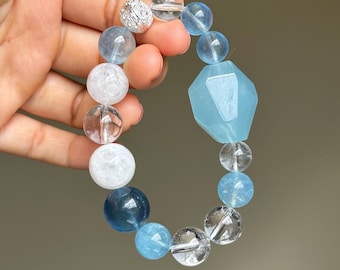 ホワイトファントムクォーツブレスレット（フローライトセンター