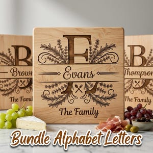 May include: Wooden cutting boards with engraved family names and initial letters. The boards feature decorative floral designs and the text "The Family". The image also includes grapes, cheese, and prosciutto. The text "Bundle Alphabet Letters" is also visible.