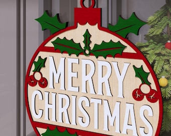May include: A wooden Christmas ornament shaped like a red and white ornament with holly leaves and berries. The ornament says "Merry Christmas" in white letters.