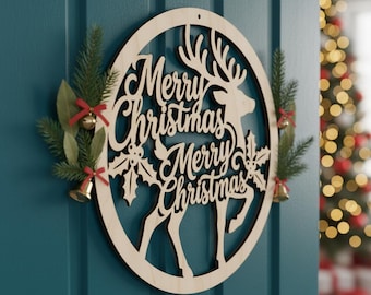 May include: A wooden Christmas wreath featuring the text "Merry Christmas" and a reindeer design. The wreath is adorned with green foliage, red bows, and small gold bells. It is mounted on a teal door.