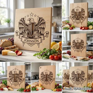 May include: A collection of personalized wooden cutting boards. Each board features an engraved eagle design with a letter and family name. The boards are light-colored wood and are surrounded by food items like bread, cheese, and fruit.
