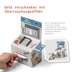 May include: A white cardboard cash machine with a colourful design. The machine has a slot for inserting money and a button that says "CASH". The machine is labelled "CASH MACHINE" and has a sign that says "YEAH!" on the side. The machine is designed to be a fun and creative way to give money as a gift.
