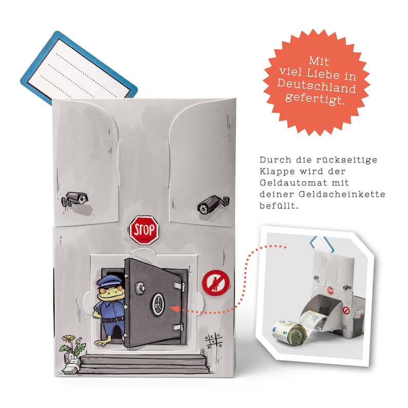 May include: A grey metal money box shaped like a bank vault with a cartoon frog wearing a blue uniform standing in the doorway. The box has a red stop sign, a security camera, and a no entry sign. The box has a flap on the back that opens to reveal a slot for inserting money. The text on the box reads "Mit viel Liebe in Deutschland gefertigt."