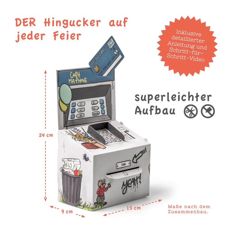 May include: A cardboard model of a cash machine with a cartoon design. The model is 9 cm wide, 15 cm long, and 24 cm tall. The model includes a credit card, a balloon, and the text "Cash Machine" and "Yeah!"