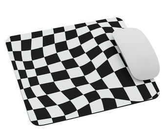 May include: A black and white checkered mouse pad with a wavy pattern. A white computer mouse is on the pad.