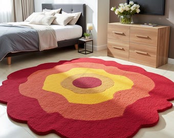 May include: A red, orange, and yellow round rug with a flower-like shape. The rug has a multi-layered design with a red center circle.