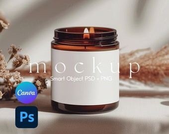 May include: A brown glass candle jar with a white label that says "mockup Smart Object PSD + PNG". The candle is lit and there is a white fabric background.