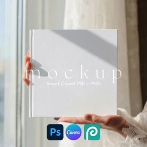 May include: A white square book mockup held by a person. The word "mockup" is printed on the book. Below the text are the words "Smart Object PSD + PNG". The image also includes the logos for Photoshop, Canva, and Placeit.
