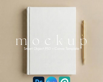 May include: A white hardcover book with the word "mockup" in a delicate font. A gold pen rests beside the book. The text "Smart Object PSD + Canva Template" is below the word "mockup". Icons for Photoshop, Canva, and Placeit are at the bottom.