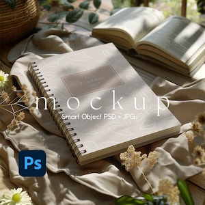 May include: A spiral-bound daily planner for 2025 with a light beige cover featuring a white line-art leaf pattern. The planner has a rectangular label on the front with the text daily PLANNER 2025. A blue Adobe Photoshop icon is visible in the corner.