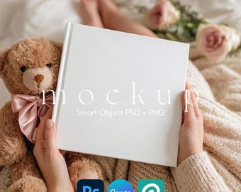 May include: A white book mockup held by a person, with the word "mockup" printed on the cover. A brown teddy bear with a pink bow sits next to the book. The image also includes the logos for Photoshop, Canva, and PicMonkey.