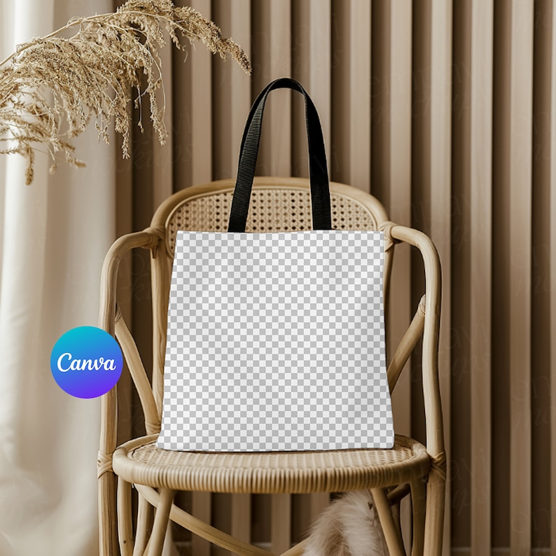 May include: A white tote bag with black handles sits on a wicker chair. The bag is blank and ready for customization.