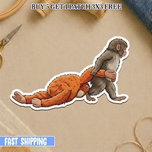 May include: A sticker featuring two cartoon monkeys. One is orange and lying down, while the other is gray and walking, carrying the orange monkey. The text "BUY 5 GET 1 PATCH 3X3 FREE" is at the top. The text "FAST SHIPPING" is at the bottom.
