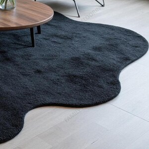 Irregular Shaped Solid Black Handmade Tufted Area Rug - Stylish Home ...