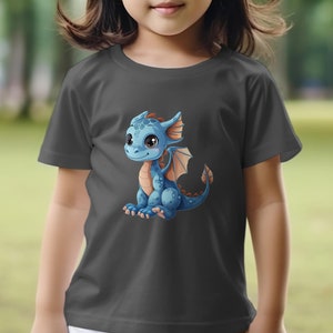 Niedliches blaues Drachen-Karikatur-Illustrations-T-Shirt, Kinder-Fantasie-Kreatur-Grafik-T-Shirt, Unisex-Kinderkleidung, Geschenkidee