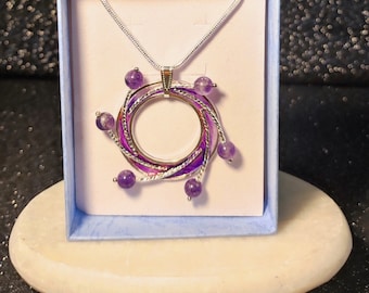 Necklace with amethyst pendant and 925 silver ornaments