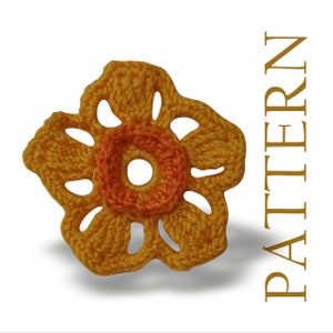 May include: A crocheted flower with a yellow outer layer and an orange center. The flower has a lacy design and is perfect for adding a touch of handmade charm to any project.