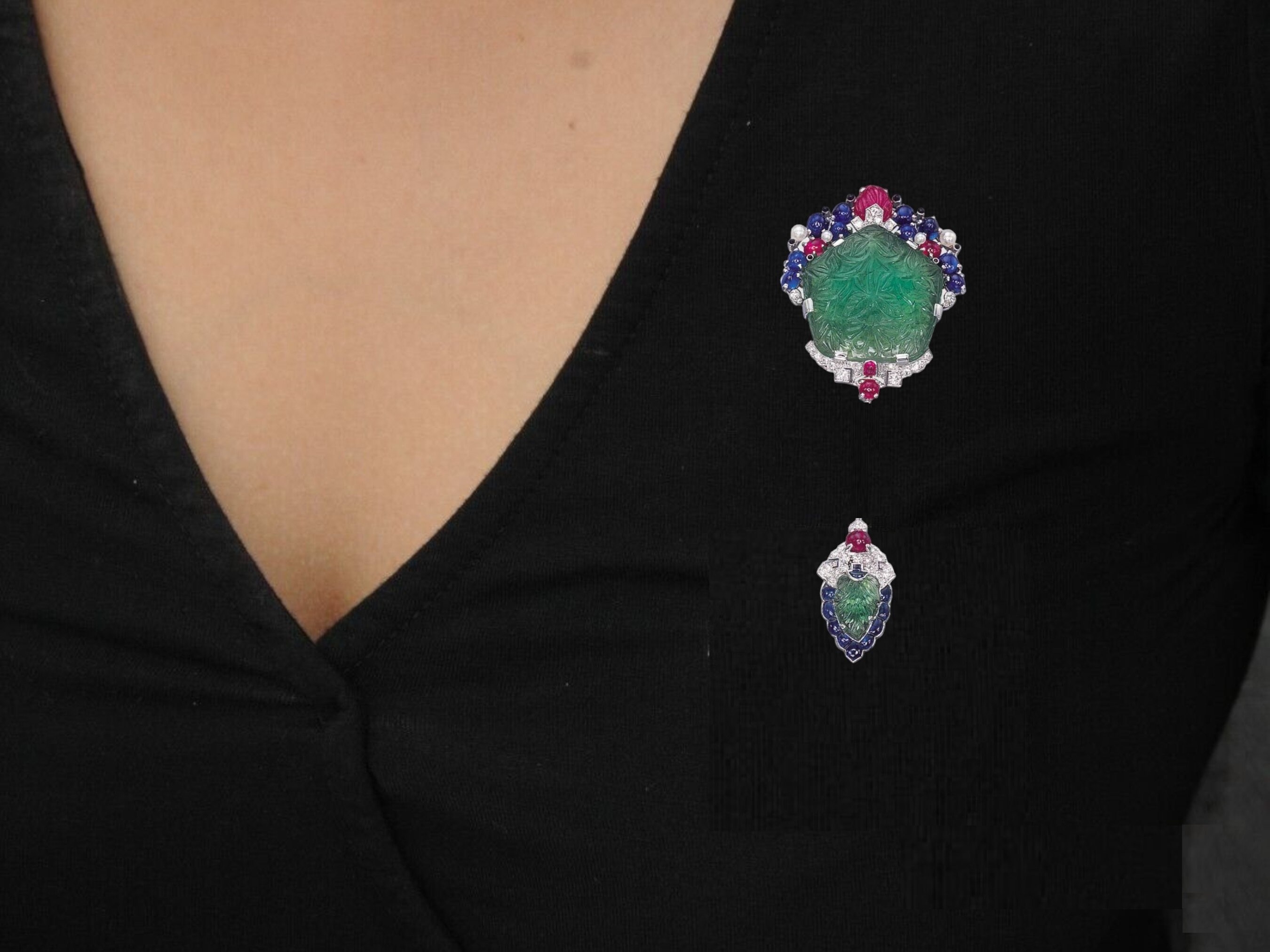 A diamond and emerald jabot pin, by Tiffany and Co, c. 1925