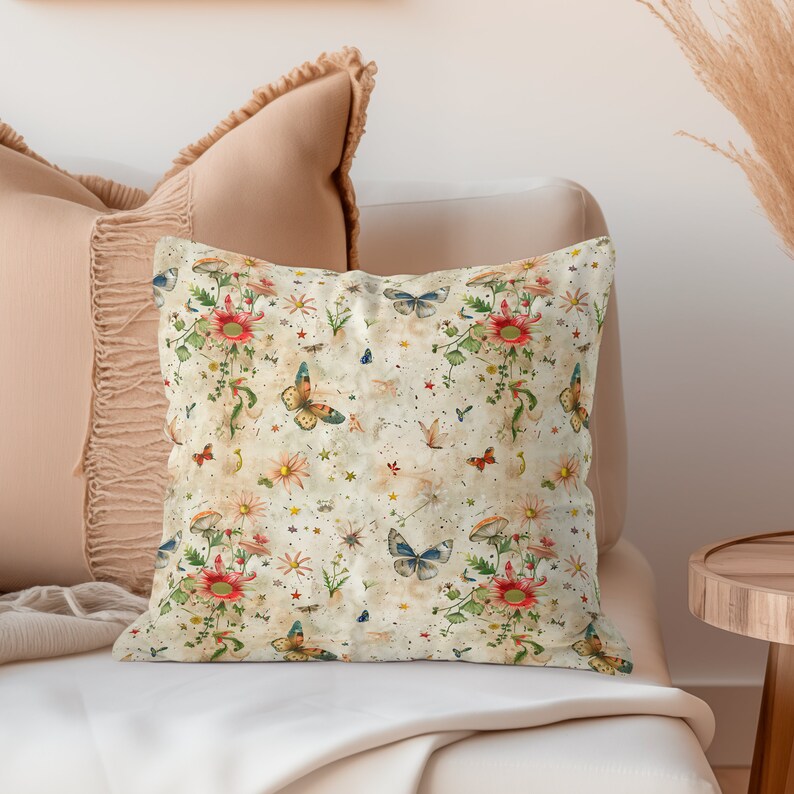 May include: A decorative throw pillow with a cream background featuring a repeating pattern of colorful butterflies, flowers, and stars.