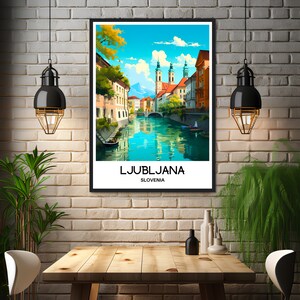 May include: A vintage travel poster featuring a colorful illustration of Ljubljana, Slovenia. The poster depicts a canal with buildings lining the sides and a church in the background. The text "LJUBLJANA" and "SLOVENIA" is printed at the bottom of the poster.