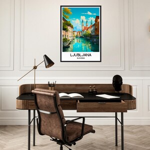 May include: A vintage travel poster featuring a colorful illustration of Ljubljana, Slovenia. The poster shows a cityscape with buildings, a river, and a bridge. The text "LJUBLJANA" and "SLOVENIA" is printed at the bottom of the poster.
