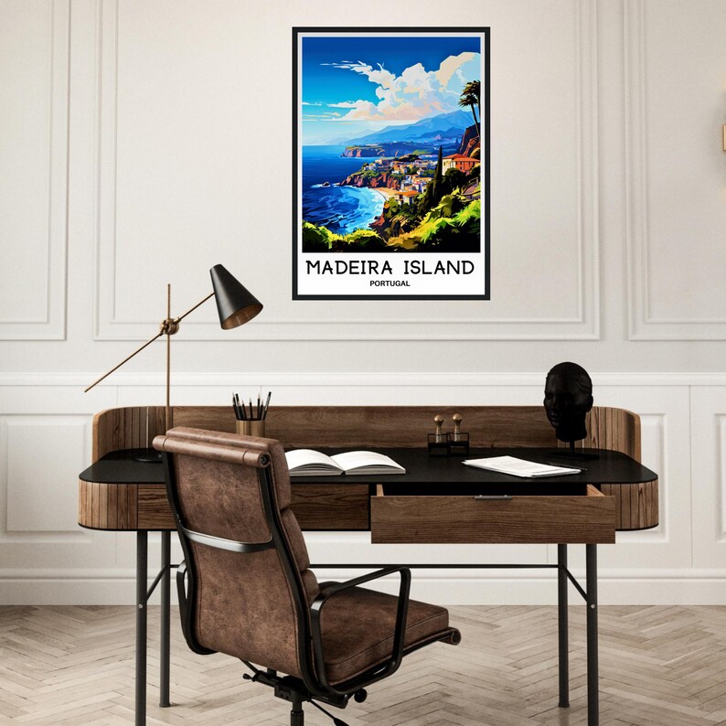 May include: A vintage travel poster featuring a colorful illustration of a coastal town in Madeira Island, Portugal. The poster has a black frame and the text "Madeira Island, Portugal" at the bottom.